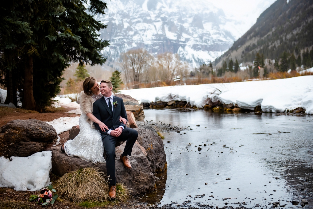 couple by a river - how to plan an elopement