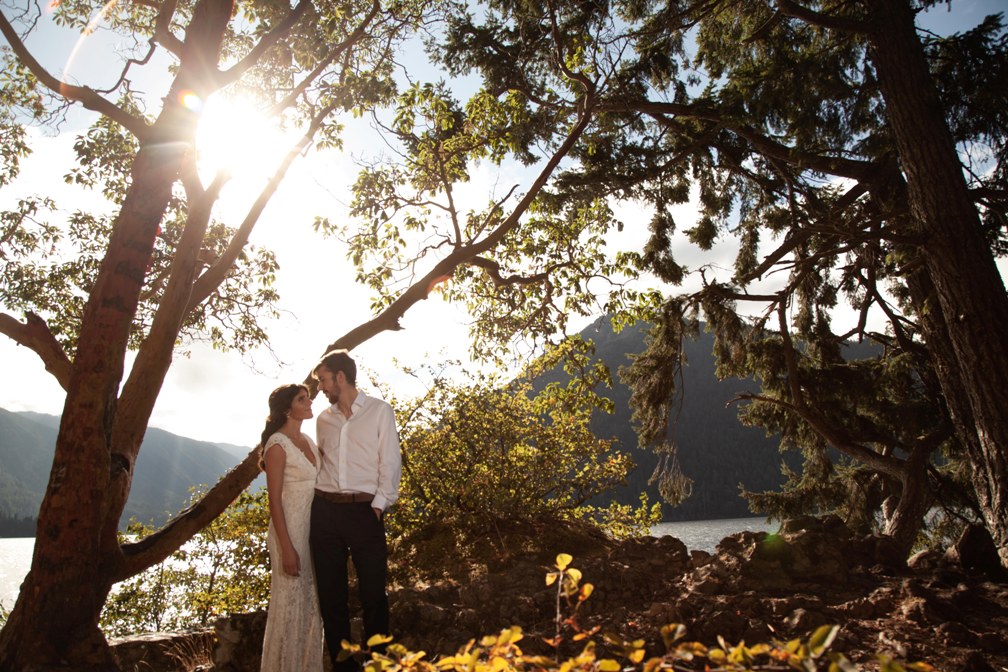 couple planning an elopement by a mountain lake