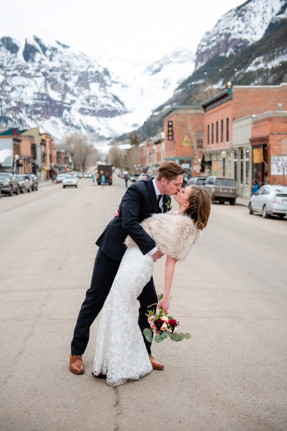 Couple kissing in the streeet - Telluride elopement