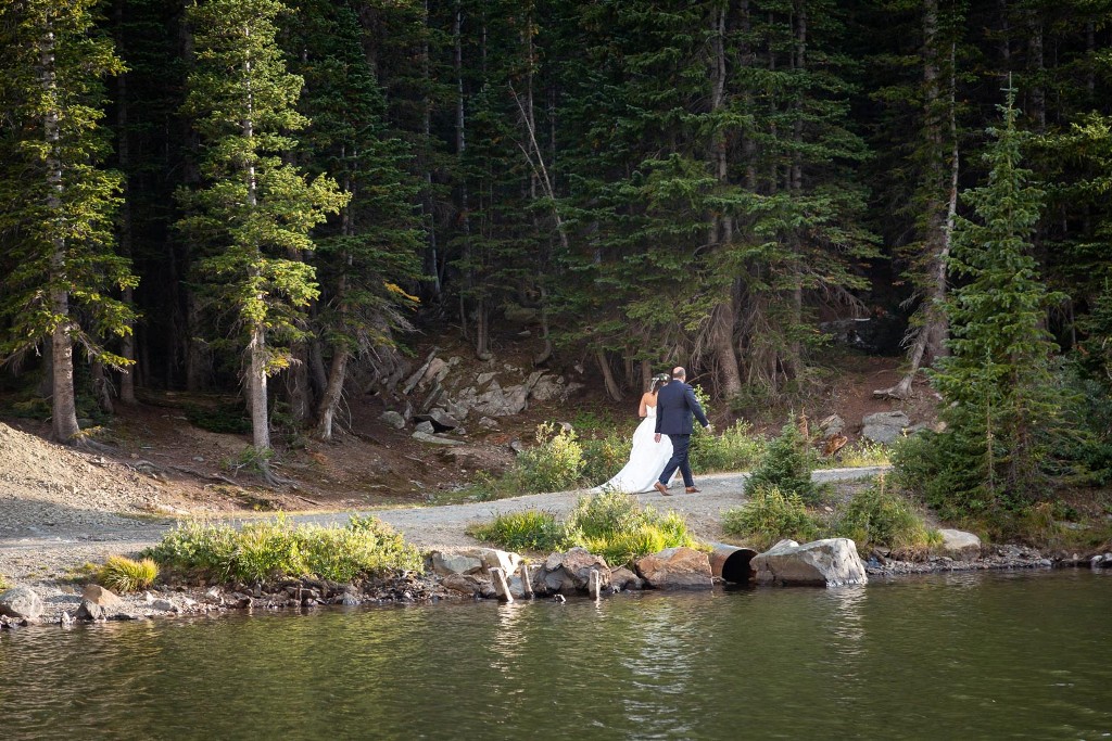 walking along the shores of the lake - Rocky Mountain destination wedding