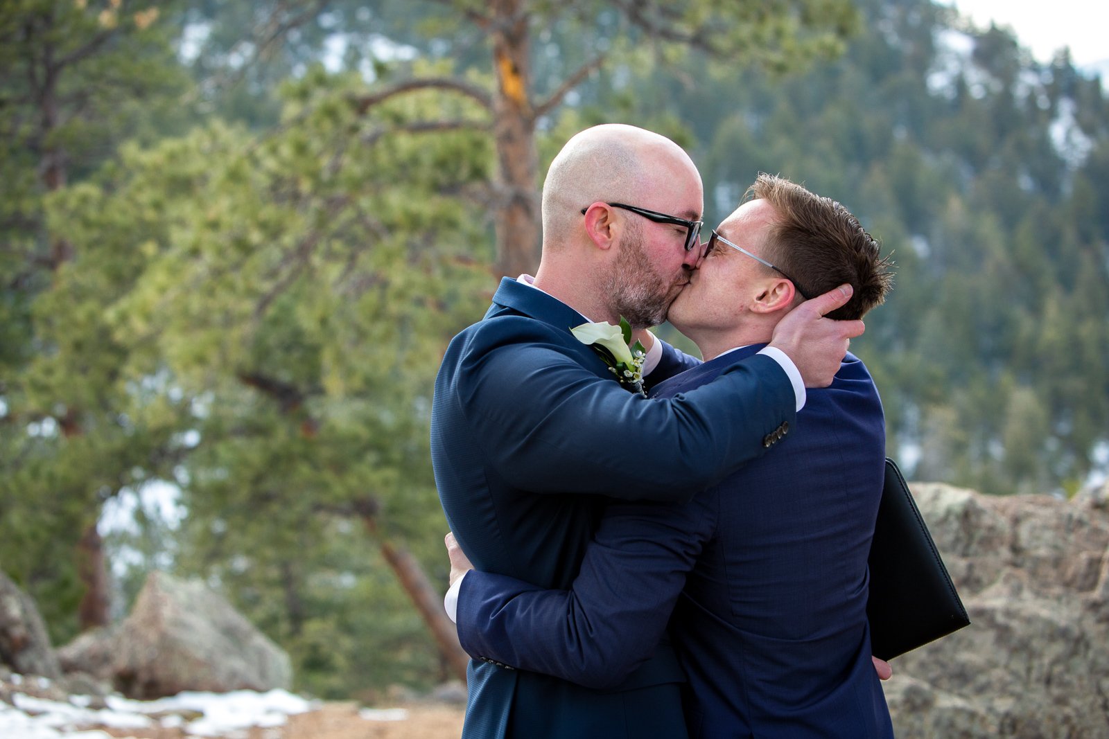 sam-sex couple first kiss at their Lookout Mountain elopement