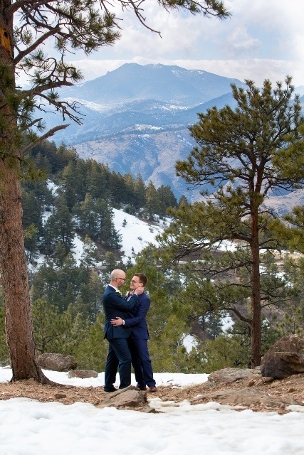 the newlyweds in the snow atop Lookout Mountain