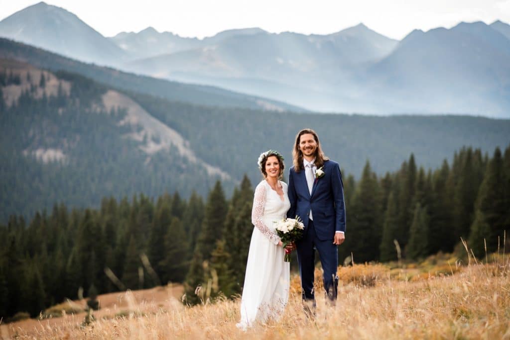 couple standing in a mountain meadow on Boreas Pass