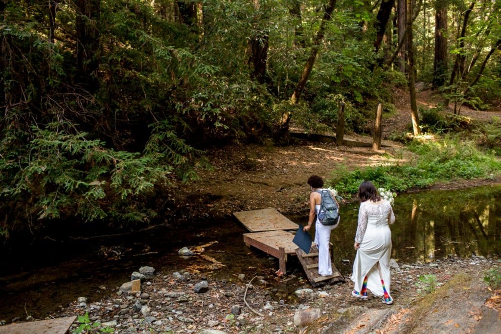 arriving in the redwoods for their wedding ceremony