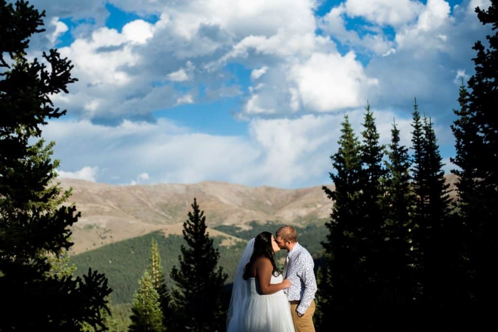 bride and groom in the mountains of Breckenridge