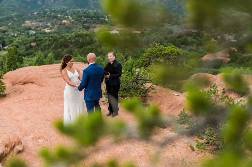 wedding ceremony through the trees