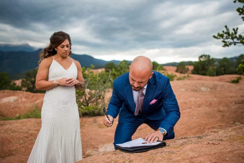 Jeff signing the Colorado marriage license