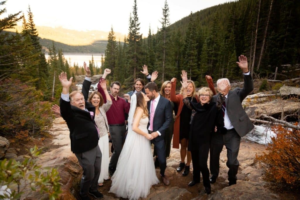 wedding guests waving