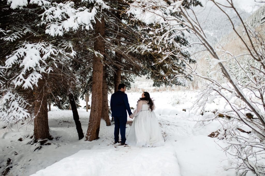 Krizelle and Enrique (bride and groom) hand in hand