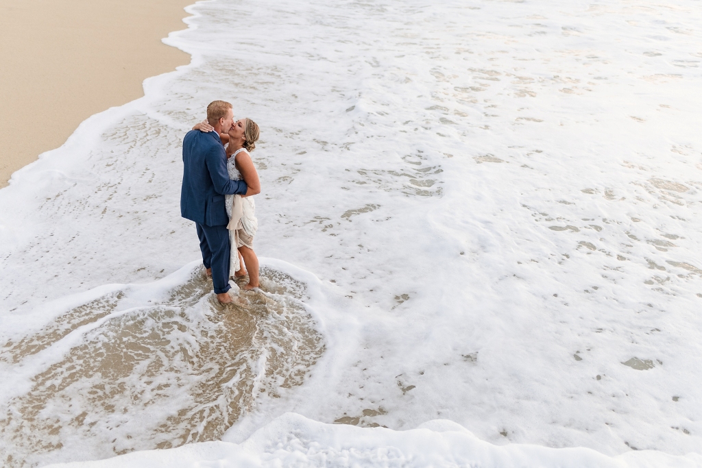 Couple standing in the surf - California beach elopement
