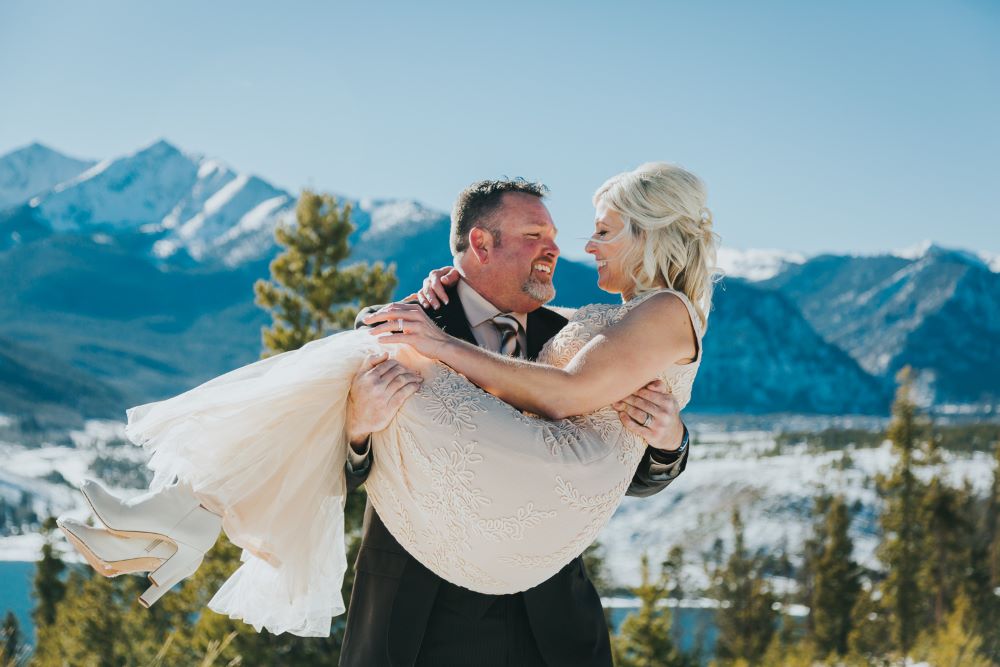 Bride and groom in the CO mountains in winter