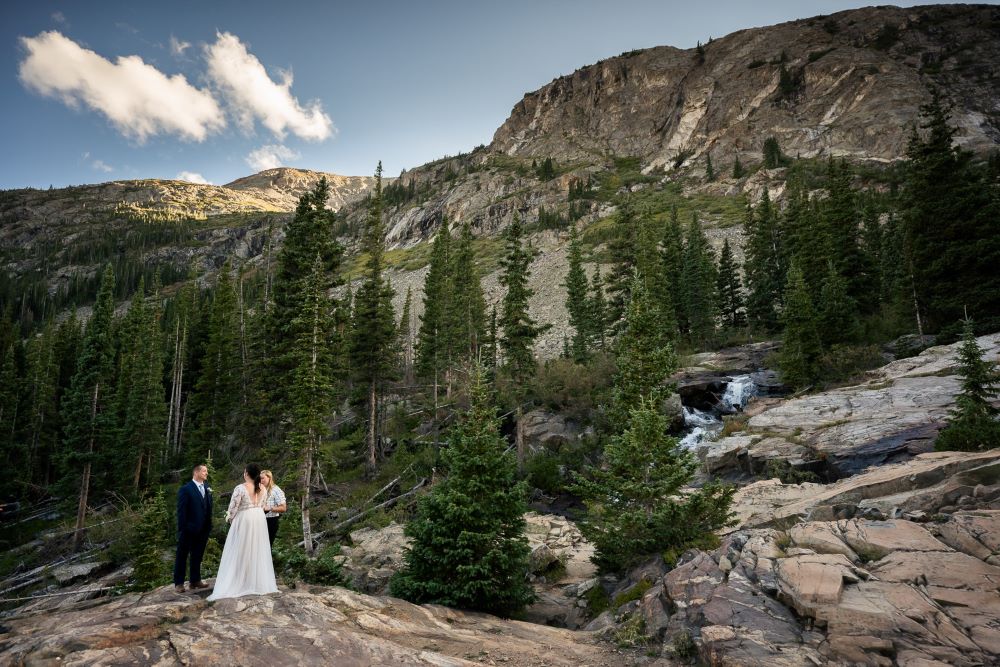 eloping at a waterfall in Breckenridge