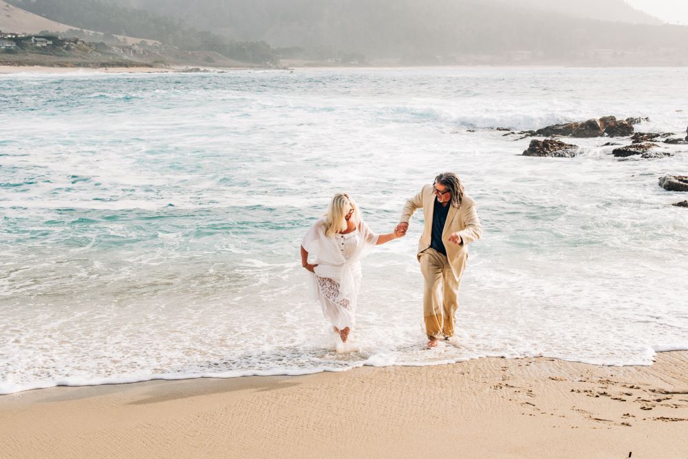 Eloping couple in the surf - California State Parks