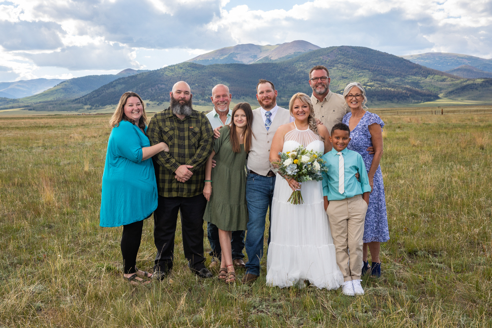 Wedding guests with couple at their Colorado micro-wedding