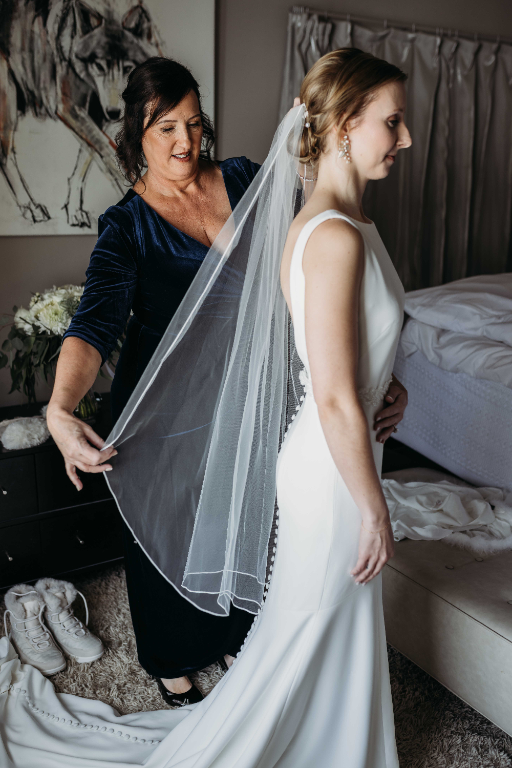 mom fixing bridal veil