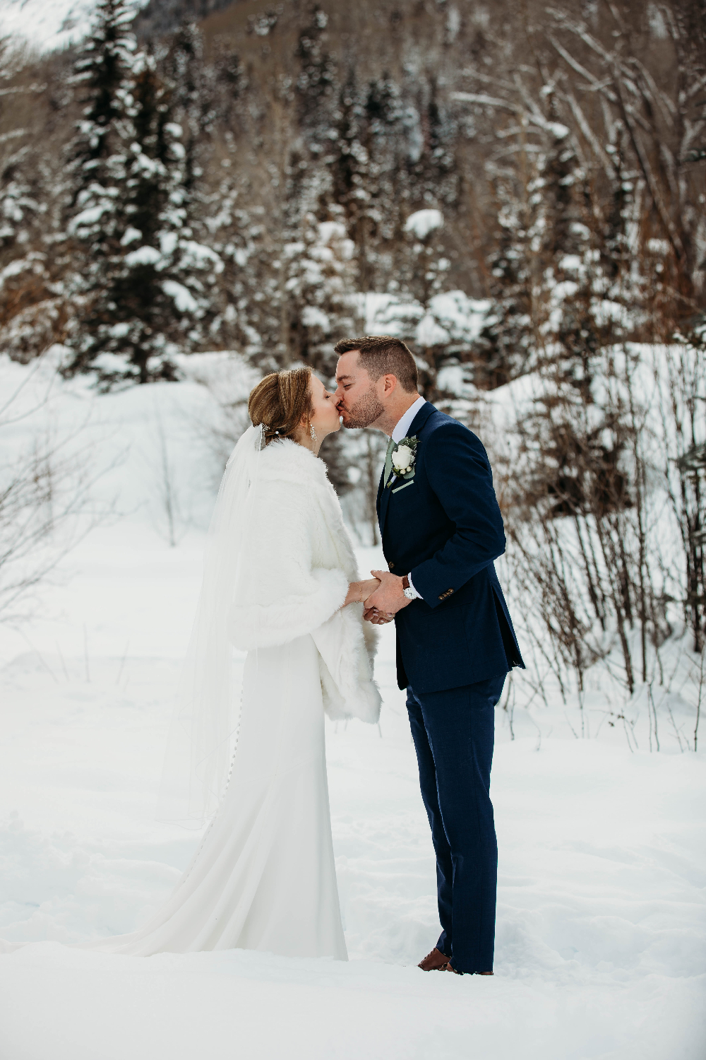 Pre-ceremony kiss - Colorado elopement in winter