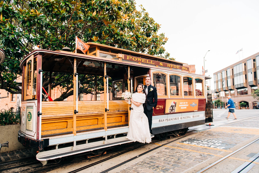 Eloping couple on cable car - San Francisco